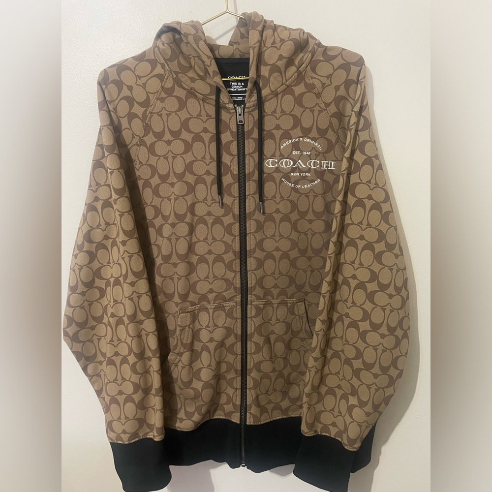 Signature Coach Zip Hoodie.